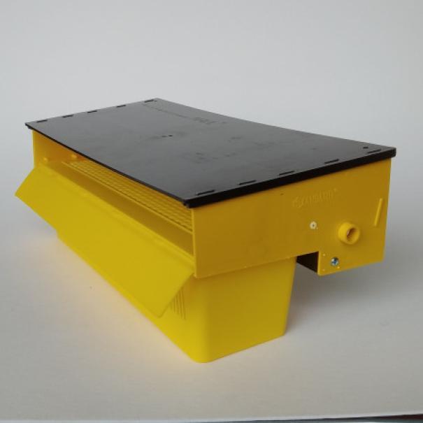 Vista laterale trappola raccolta polline gialla con cassetto in plastica