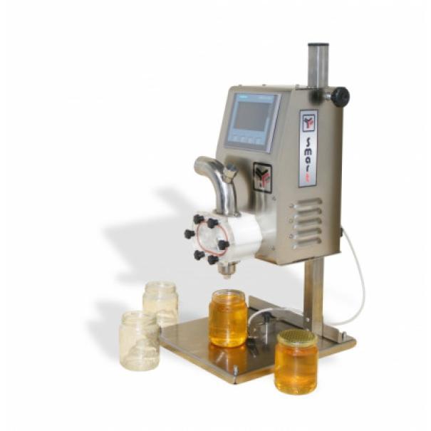 Dosatrice elettronica professionale per miele in acciaio inox con vasetti